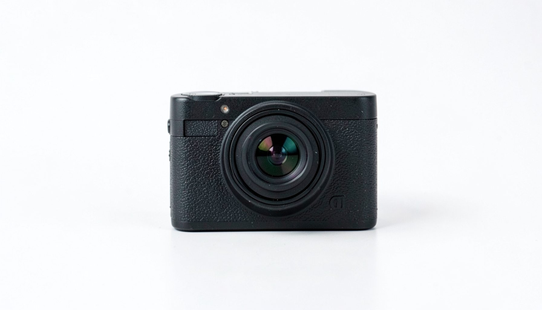 A small rectangular time-lapse camera body with a lens, shown on a clean white surface with subtle shadows